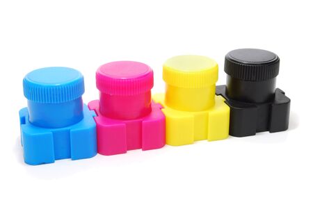 Four Ink  Paint  Cans of Cyan, Magenta, Yellow and Black Color  CMYK Concept  Isolated on Whiteの写真素材