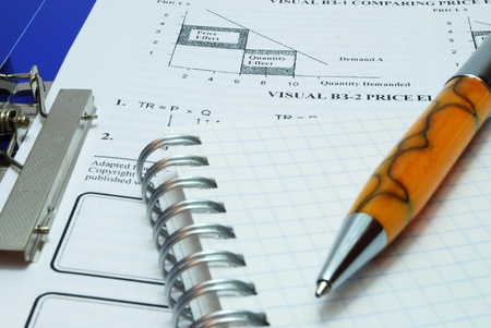 Ballpoint Pen on Notebook and Document Isolated on Whiteの写真素材