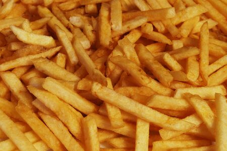 Fastfood Fried Potato Pieces Closeup For Backgroundの写真素材
