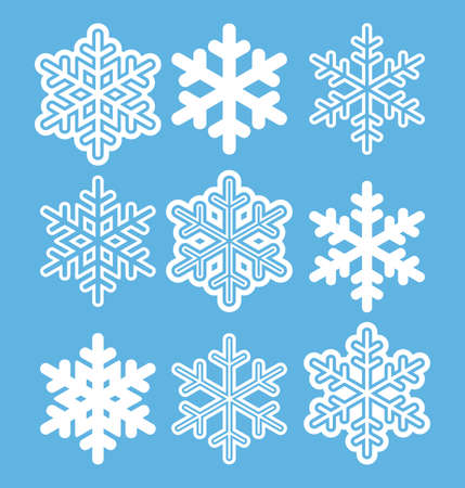 Set of nine white snowflakes isolated on blueのイラスト素材