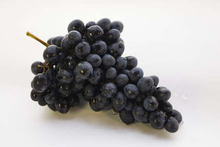 cluster of grapes on the white backgroundの写真素材