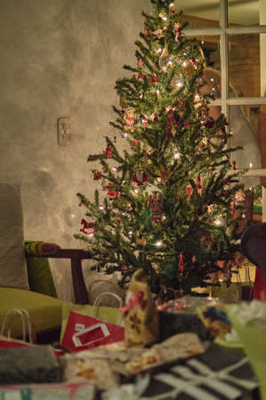 Christmas tree with traditional lights and decorationsの写真素材
