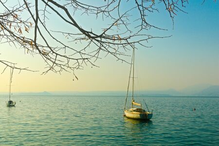 landscape of a boat on the lakeの写真素材