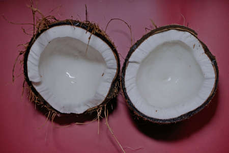 coconut fruit with irregular cut on neutral background