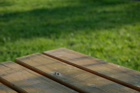 Wooden table in the garden. Selective focus. natures.