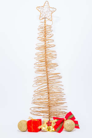 Christmas and New Year decoration on rustic old wooden board consist gift box, balls, silver, gold red, space for copy or textの写真素材