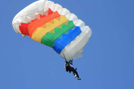 Skydiver Landing On The Ground With The Parachute Openのeditorial素材