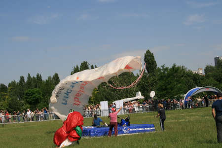 Skydiver Landing On The Ground With The Parachute Openのeditorial素材