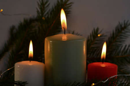 Christmas card with a candle. New year background with place for text, New Year 2022. Bright christmas tree. Christmas mock upの写真素材