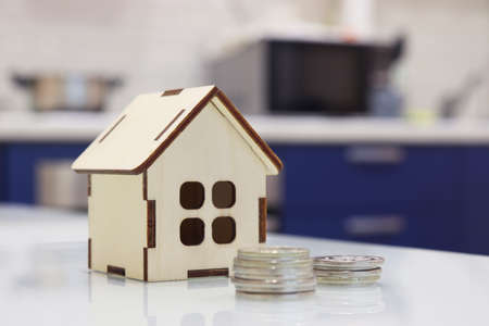 Buying a new home. Layout on the topic of mortgage. Key mortgage rates. House for sale. Moving to a new place of rasidence.の写真素材