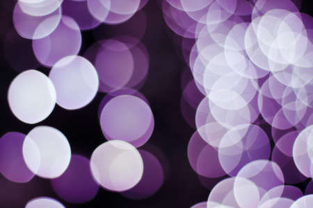 Christmas background with bokeh. Abstract background with bright bokeh. Dark abstract background. Valentines dayの写真素材