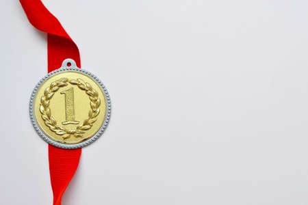 Medals for the winners. Medal for the first place. Medals on a white background. Sports medals with space for textの写真素材