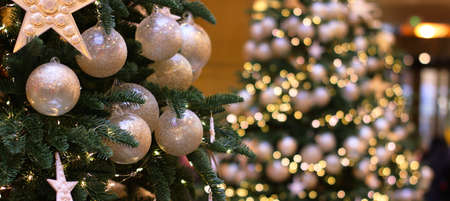 Christmas balls on christmas tree. Christmas mock up. Christmas background with place for text. High quality photoの写真素材