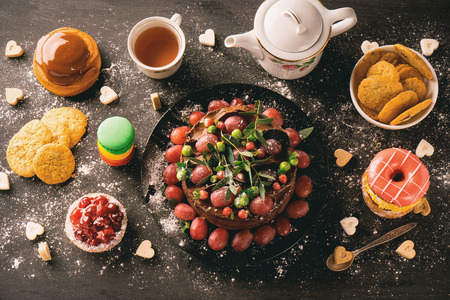 The table is full of sweetsの写真素材