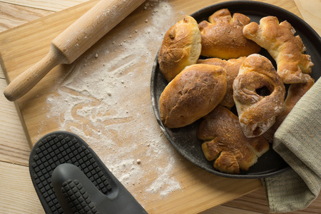 Freshly cooked patties on a cutting board