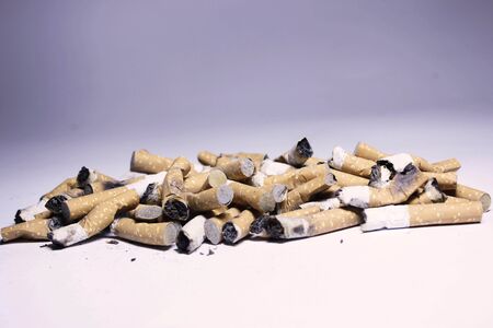 Used cigarettes filters isolated on white backgroundの写真素材
