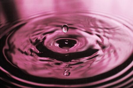 Water Drop impact on water surface - Droplet Photographyの写真素材