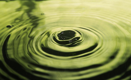 Water drop impact on water surface - Water droplet photographyの写真素材