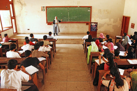 Students are attending lecture in class room in University Of Karachi 25/09/2012のeditorial素材