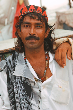 Portrait of a man at Clifton beach, Karachi, Pakistan 26/06/2012のeditorial素材
