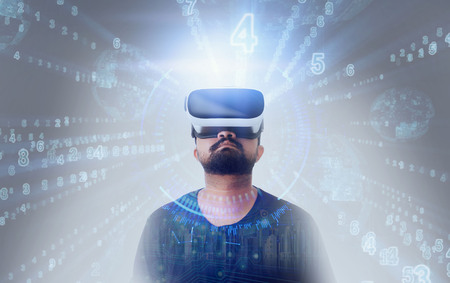 Young Guy in black t shirt looking through VR (Virtual Reality) glasses - Looking upの写真素材