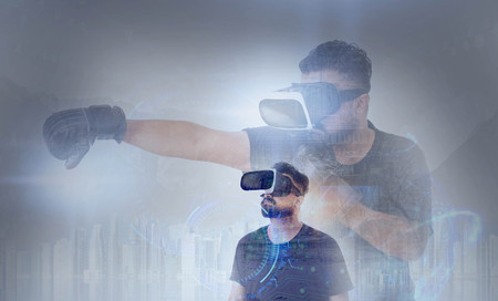 Double Exposure of Guy looking through VR (Virtual Reality) glasses - Looking into the Futureの写真素材