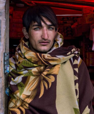 Young Men With Beautiful Green Eyes Standing At His Stall At Babusar Top, In Naran Valley, Pakistan 29/06/2018のeditorial素材