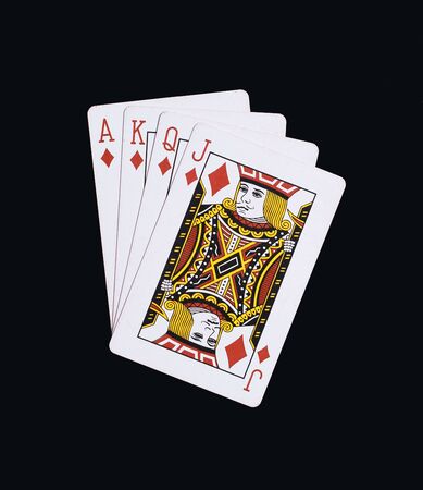 Poker diamonds of J Q K A playing cards isolated on black backgroundのeditorial素材