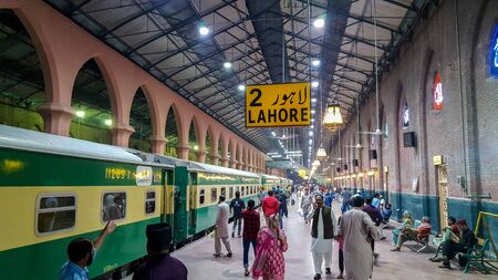 Passengers waiting for their train at Lahore Station, Pakistan At Night 03/05/2019のeditorial素材