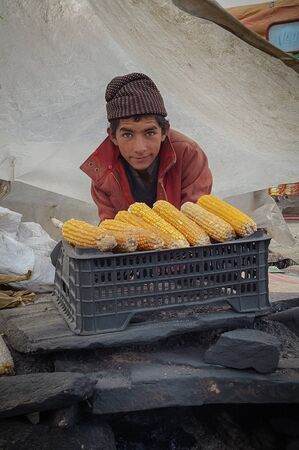 Pashtun Young Boy Selling Corn At Babusar Top, Kaghan, Kpk, Pakistan 20/08/2019のeditorial素材