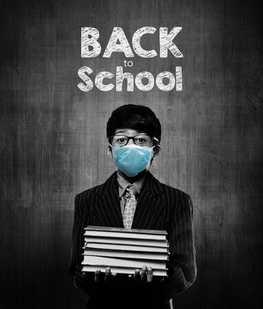 Back To School - Little School Kids Wearing Surgical Mask For Safety And Protection During Pandemic - Coronavirus - Covid 19の写真素材