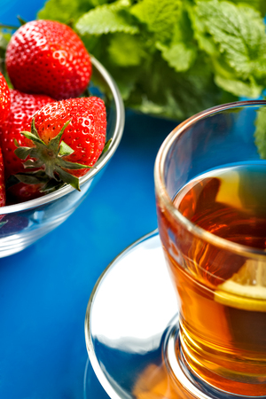 Breakfast. Tea with lemon and strawberryの写真素材