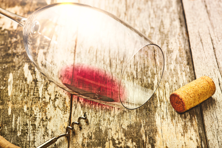 Detail of wine glasses and corks in filtered old vintage styleの写真素材