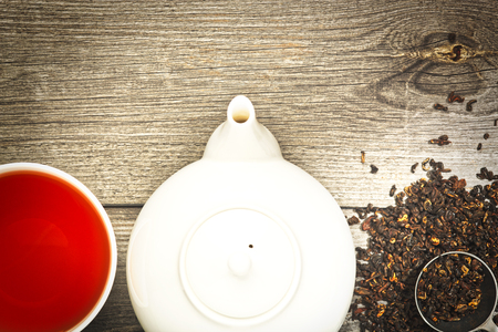 Closeup of cup of tea on vintage wooden backgroundの写真素材