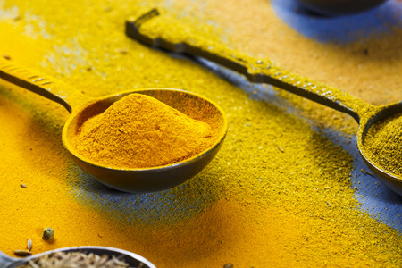 Wooden table of colorful spices. Food, indian, colorful.