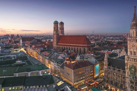 Aerial city view of Munich old town with skyline or cityscape and main cathedral in Christmas time...