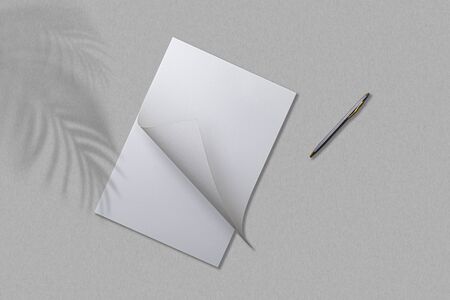 Open notebook and pen on a gray table. Top view.の写真素材