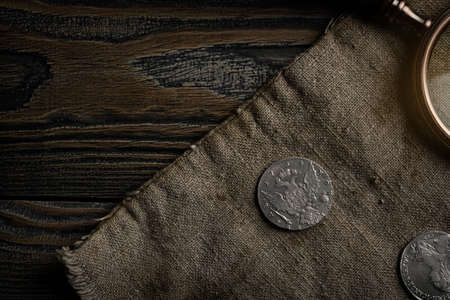 Numismatics. Old collectible coins of silver on the table. Top view.の写真素材