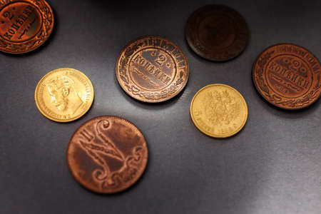 Numismatics. Old collectible coins on the table.の写真素材