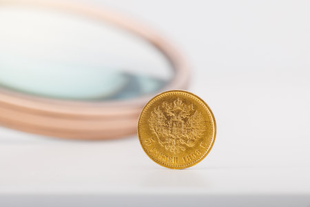 Numismatics. Old collectible coins on the table.の写真素材