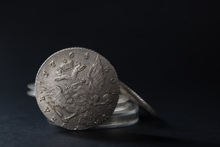 Numismatics. Old collectible coins on the table.