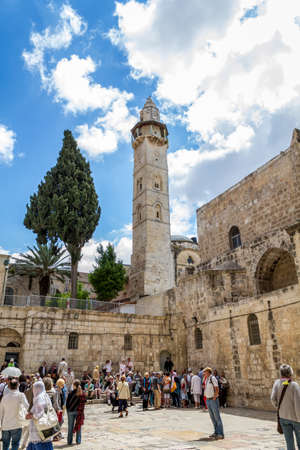 JERUSALEM, ISRAEL - OCTOBER 12: People in the square in front of the Church of the Holy Sepulchre in...
