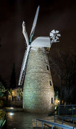 Montefiore Windmill at night illuminated by electric light, Jerusalem, Israelの写真素材