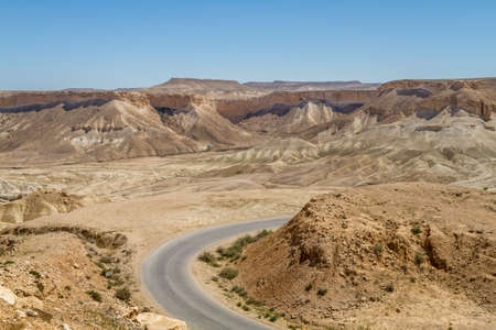The Ramon Crater, road in Makhtesh Ramon, nature reserve in Negev desert, Israelの写真素材