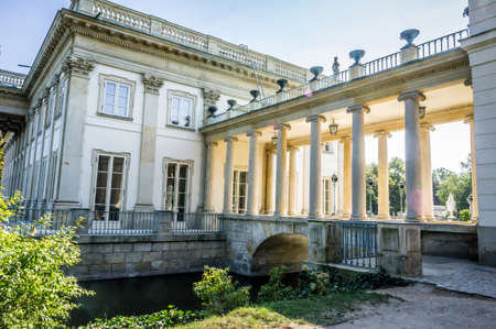 WARSAW, POLAND - SEPTEMBER 27: Little bridge with columned gallery on the Lazienki canal near the Lazienki Palace, the Palace on the Water in Royal Baths Park, Lazienki Park in Warsaw, Poland on September 27, 2016のeditorial素材