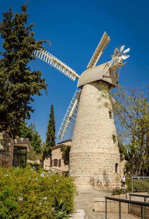 The Montefiore Windmill opposite the western city walls of the Old City in Jerusalem, Israelの写真素材