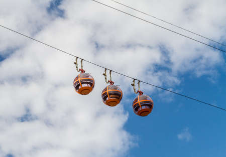 Cable Car on background of blue sky and clouds in Haifa, Israelの写真素材