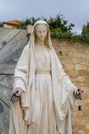 NAZARETH, ISRAEL - DECEMBER 11: Statue of Virgin Mary in courtyard of the Basilica of the Annunciation or Church of the Annunciation in Nazareth, Israel on December 11, 2016のeditorial素材