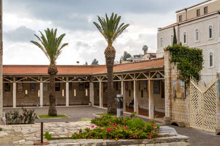 View of the Gallery with mosaic panels of Virgin Mary, courtyard of Basilica of the Annunciation, Roman Catholic church in Nazareth, Israelの写真素材