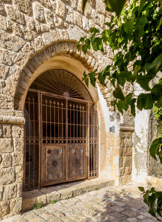 Old Vintage double door with decorative details in Old Jaffa, Israelの写真素材
